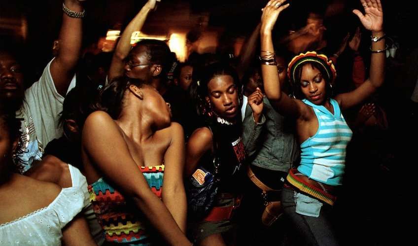 Women dancing to One Dance, dancehall style