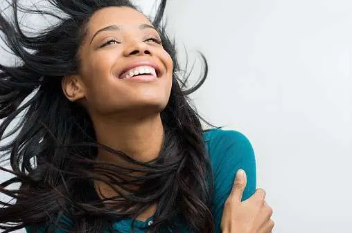 Smiling woman with Natural Straight Black Hair