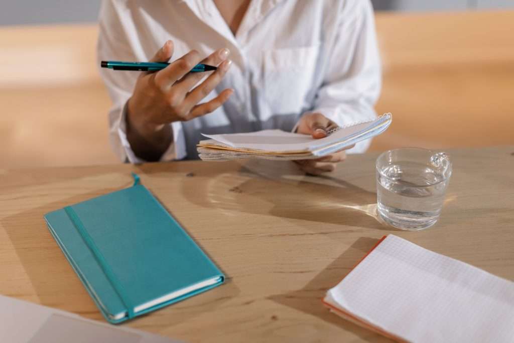 Woman thinking about writing poetry